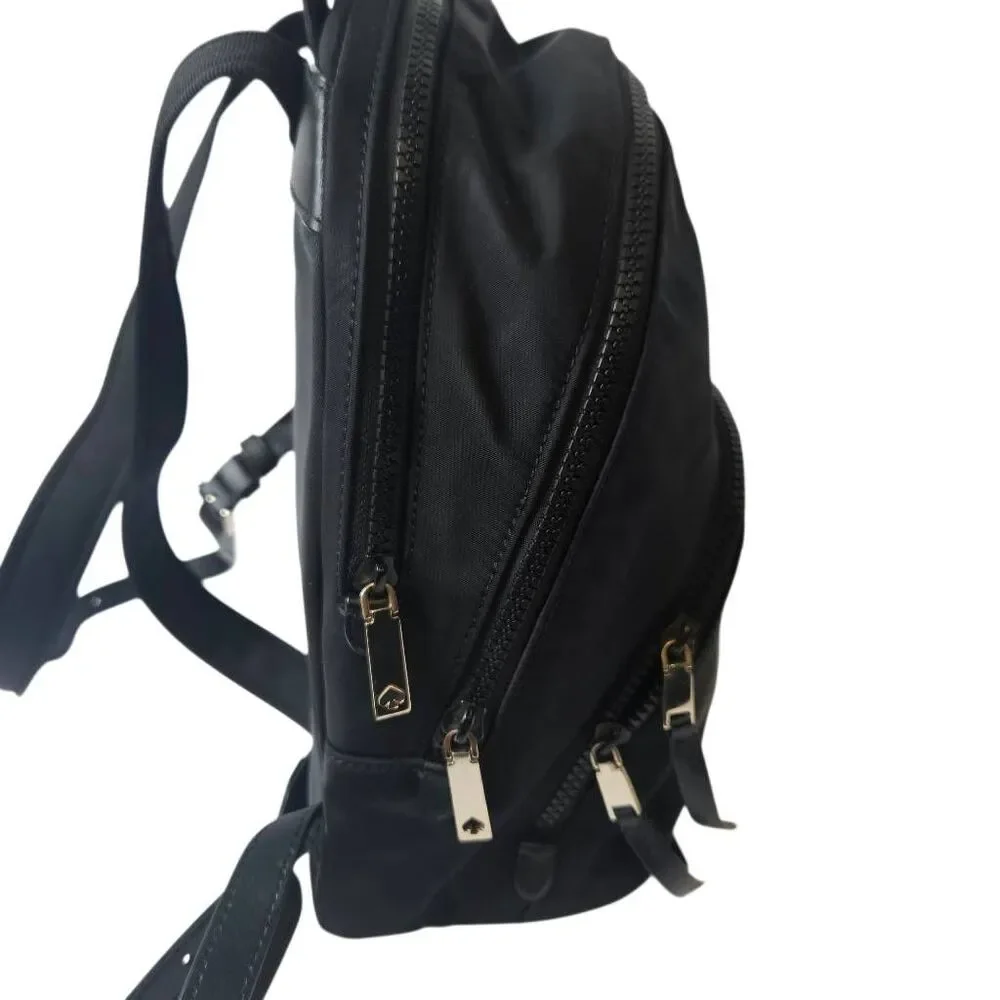 Kate Spade Karissa black nylon backpack, minimalist design.